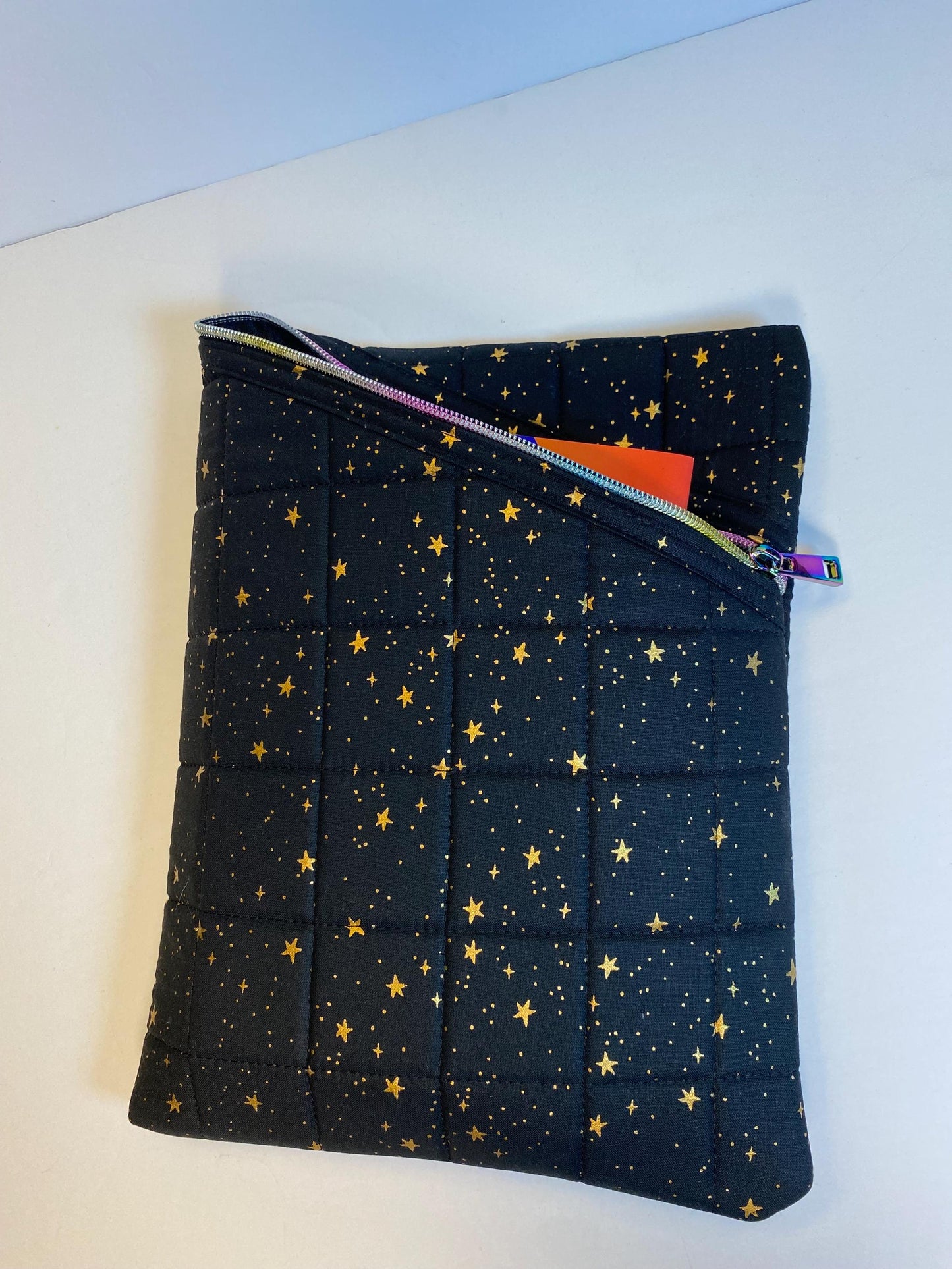 Rifle Paper Co black primavera stars fabric soft tablet case with zipper, black and gold star print quilted case with rainbow zipper