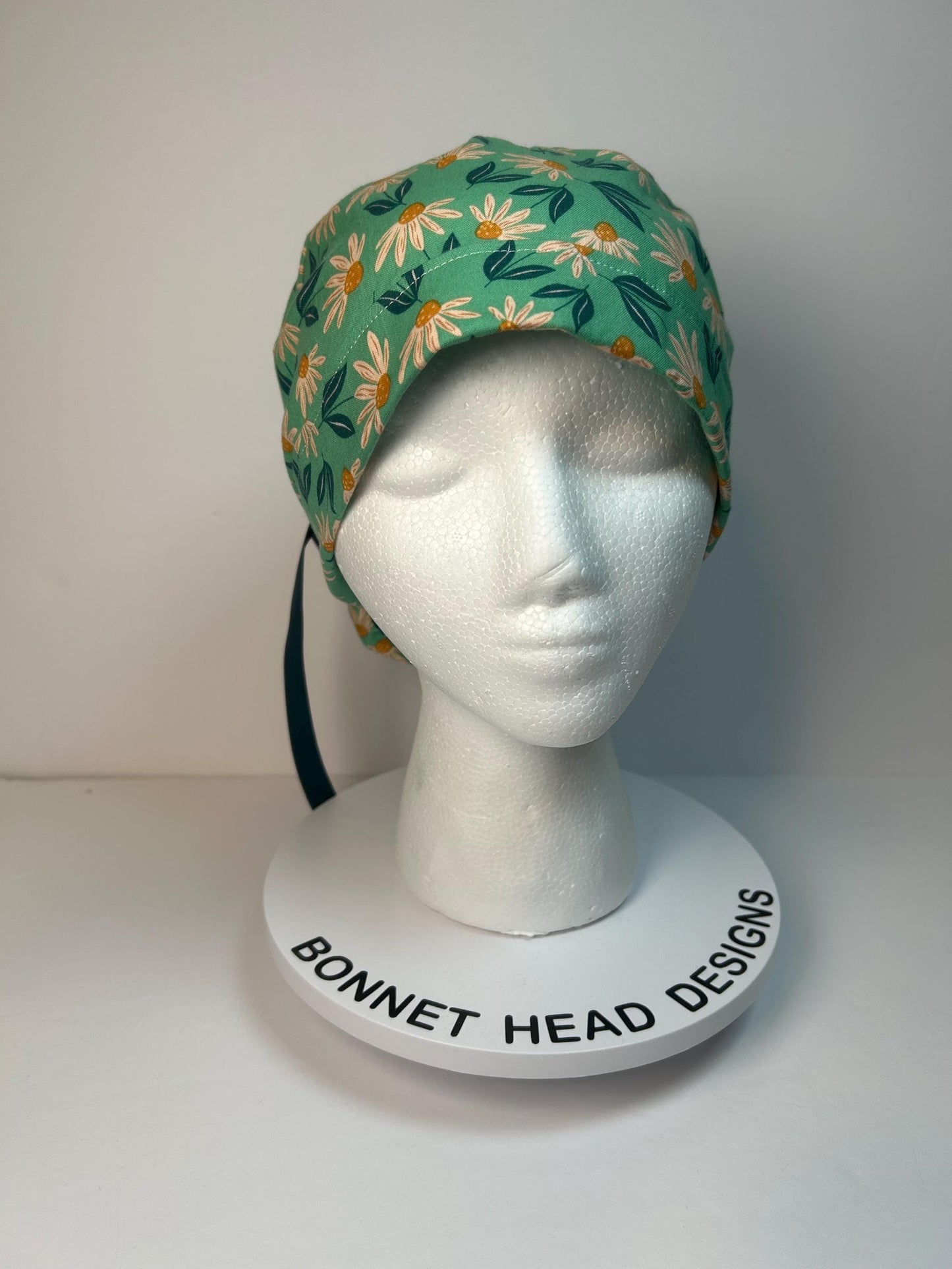 Teal daisy floral print ponytail scrub cap