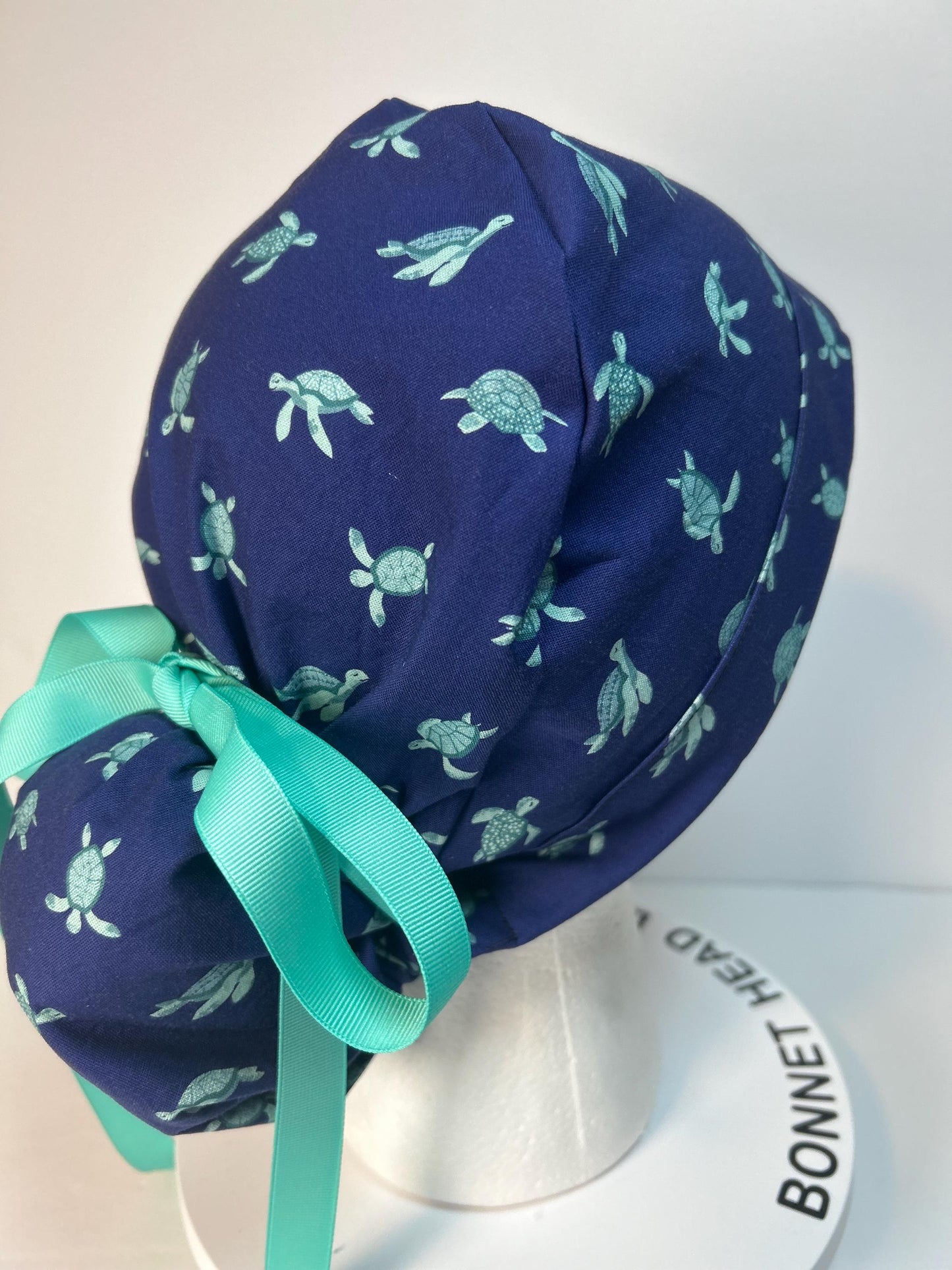 Sea turtle scrub hat, navy and green turtle women’s ponytail scrub cap, Bonnet Head Designs