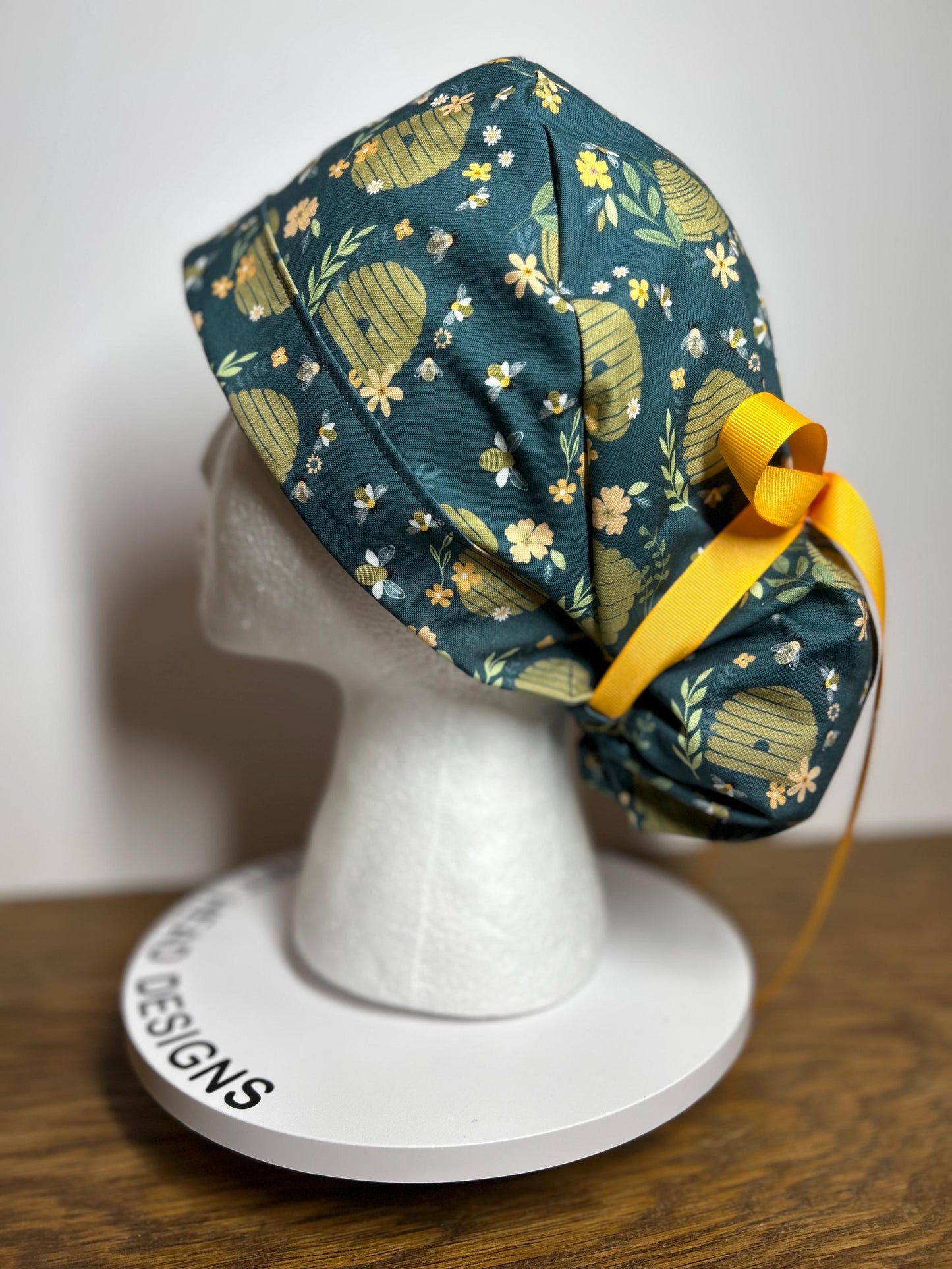 Women’s Bee print ponytail scrub cap | premium spring beehive scrub hat