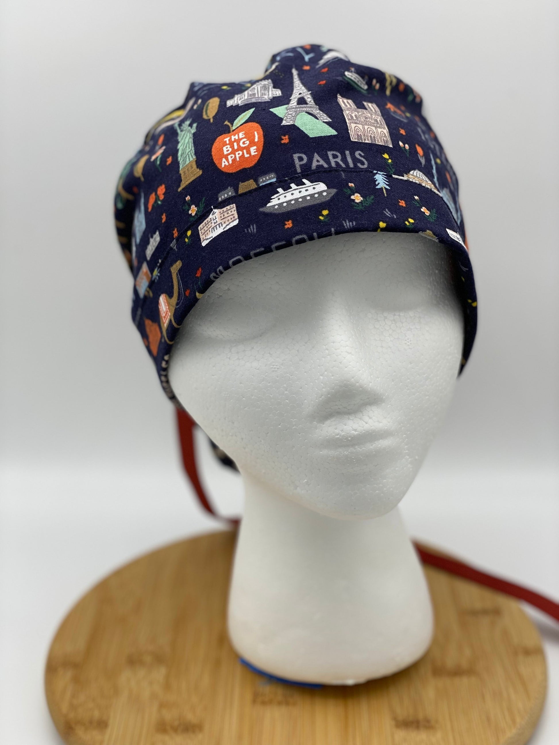 Navy Bon Voyage fabric scrub cap, traveler scrub cap, travel print scrub hat, navy world traveler scrub cap, Bonnet Head Designs