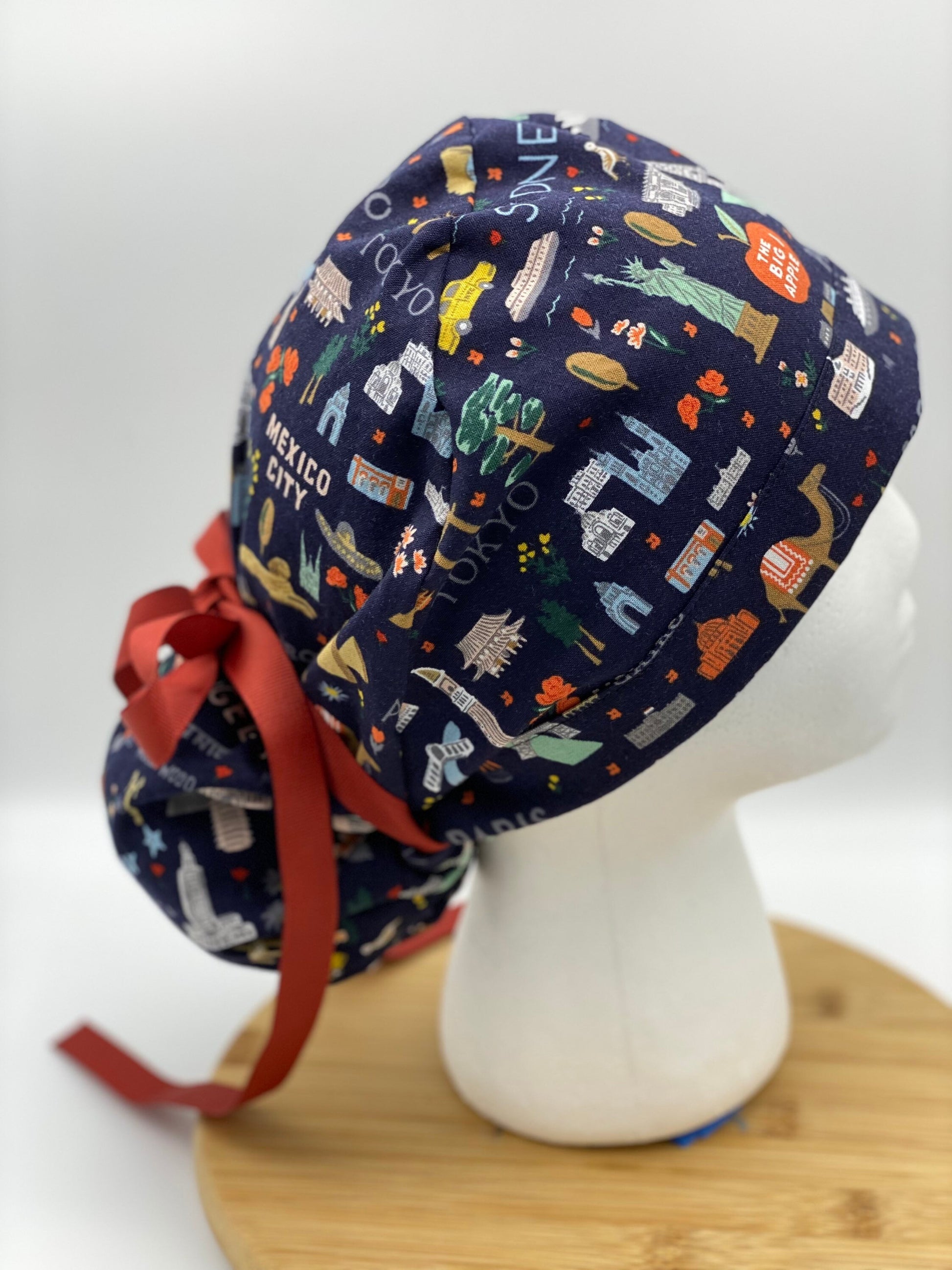 Navy Bon Voyage fabric scrub cap, traveler scrub cap, travel print scrub hat, navy world traveler scrub cap, Bonnet Head Designs