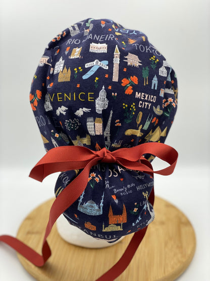 Navy Bon Voyage fabric scrub cap, traveler scrub cap, travel print scrub hat, navy world traveler scrub cap, Bonnet Head Designs