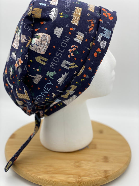 World traveler tie back scrub cap, Bon Voyage navy scrub cap, Bonnet Head Designs