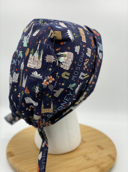 World traveler tie back scrub cap, Bon Voyage navy scrub cap, Bonnet Head Designs