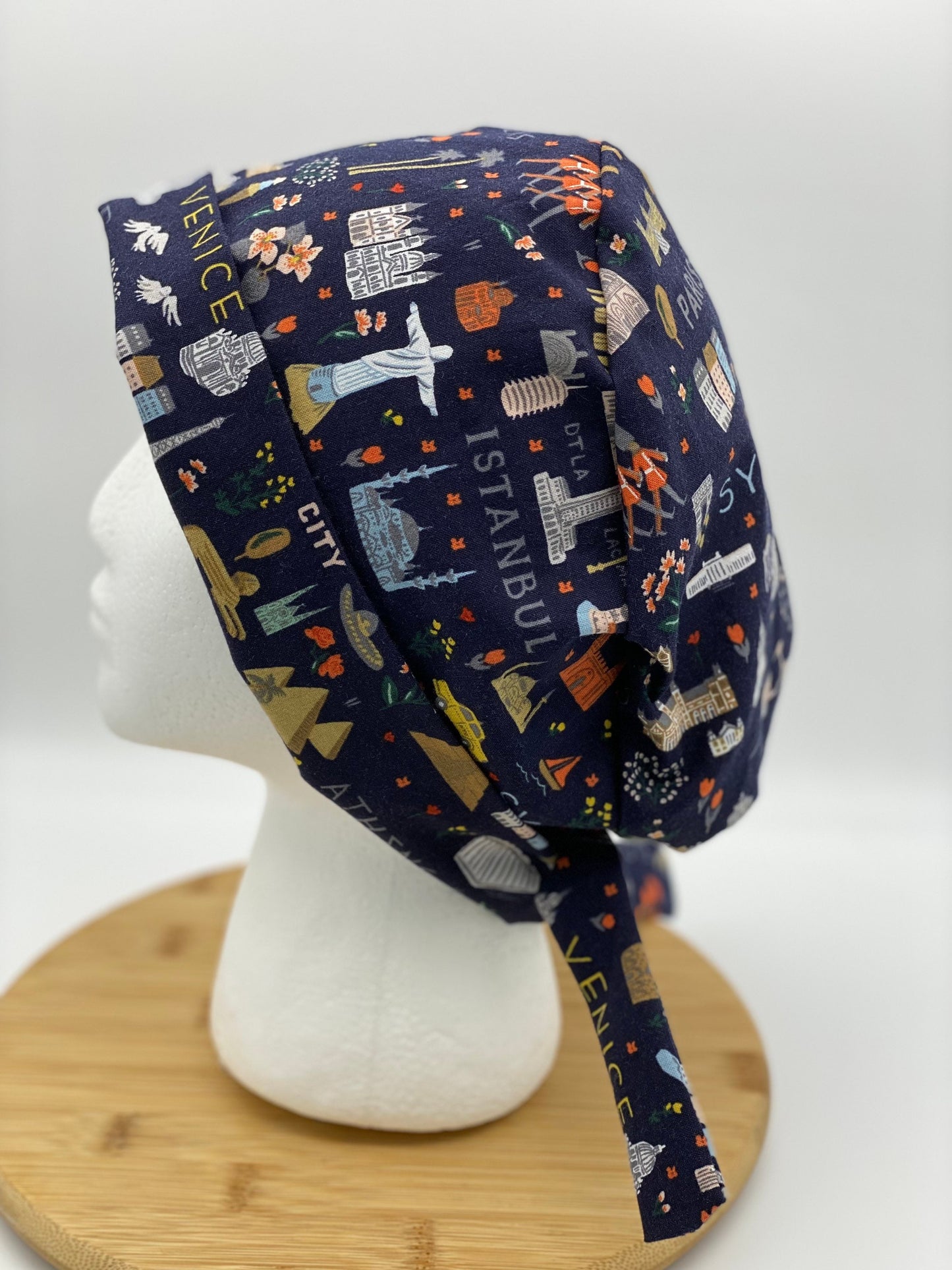 World traveler tie back scrub cap, Bon Voyage navy scrub cap, Bonnet Head Designs