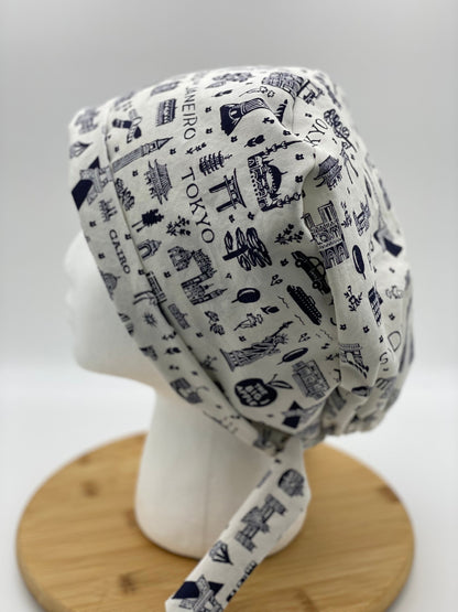 Tie back Rifle Paper co Bon Voyage fabric scrub cap, navy and white world traveler scrub cap, scrub hat tie back travel, Bonnet Head Design