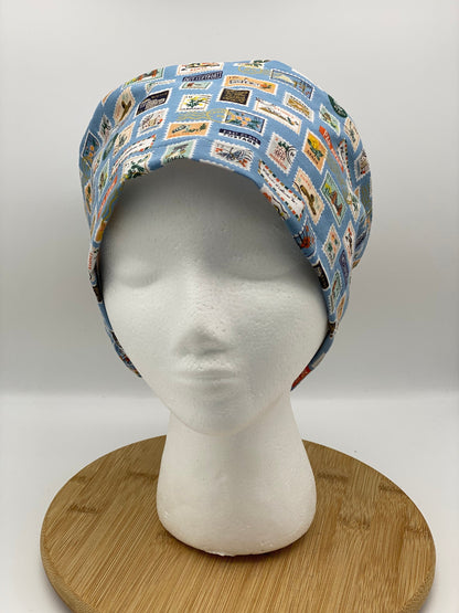 Blue postage stamp euro scrub cap, Rifle Paper Bon Voyage print women’s euro scrub cap, scrub cap stamps, Bonnet Head Designs