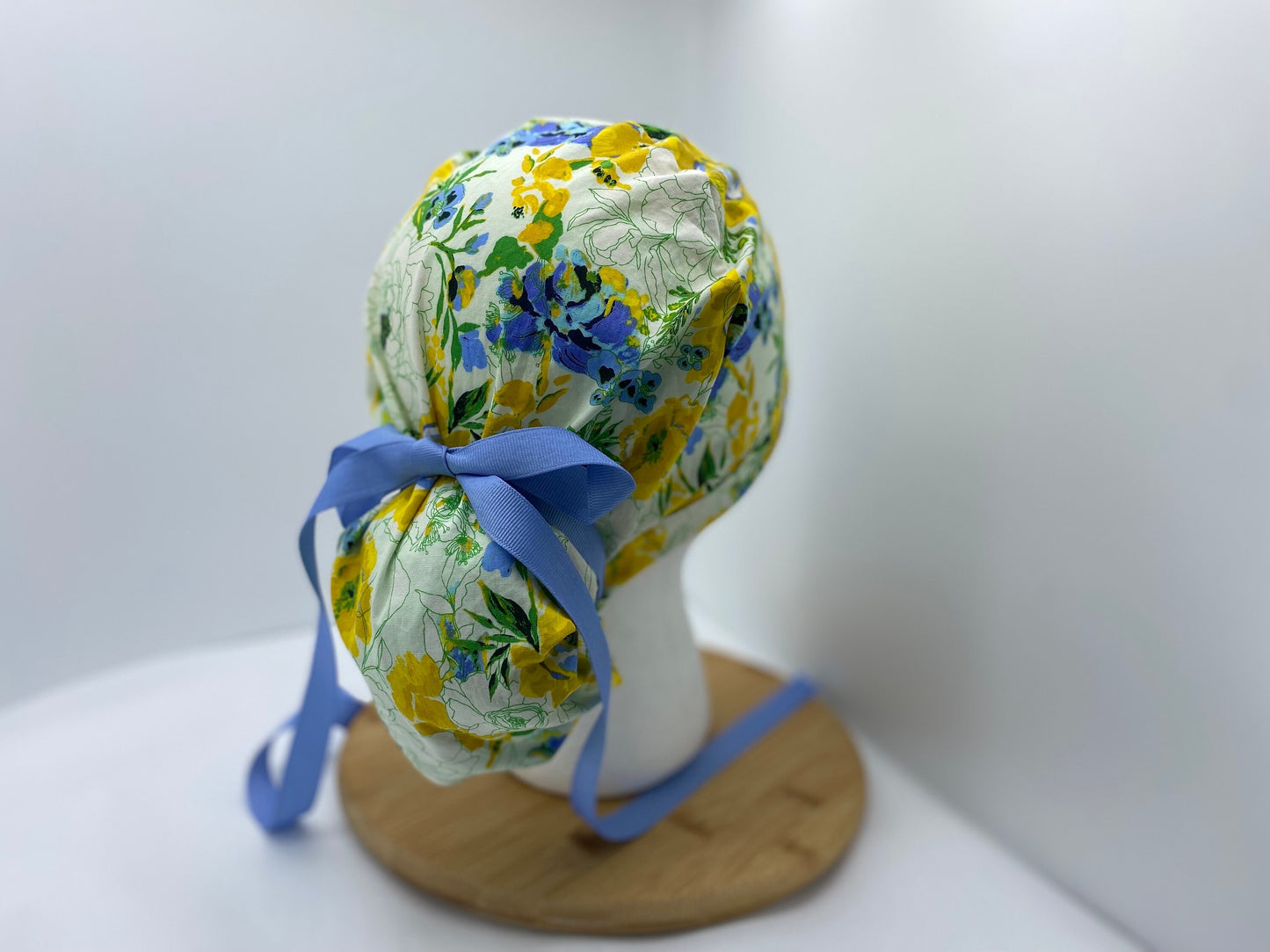 Blue, yellow, and green women’s floral scrub cap, adjustable pouch women’s scrub hat, Bonnet Head Designs