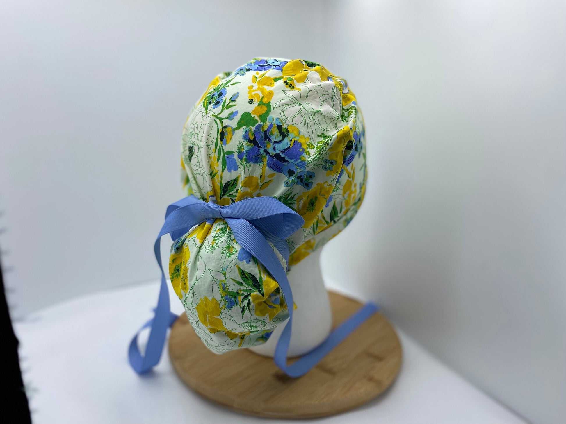 Blue, yellow, and green women’s floral scrub cap, adjustable pouch women’s scrub hat, Bonnet Head Designs