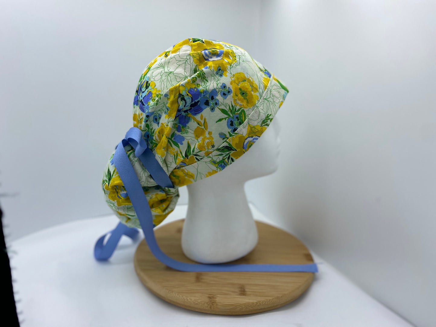 Blue, yellow, and green women’s floral scrub cap, adjustable pouch women’s scrub hat, Bonnet Head Designs