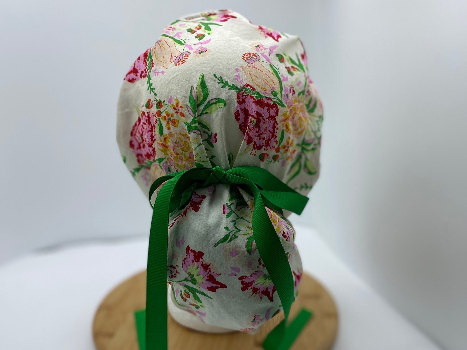 Kelly green floral women’s hat with satin lining option, adjustable pouch scrub cap