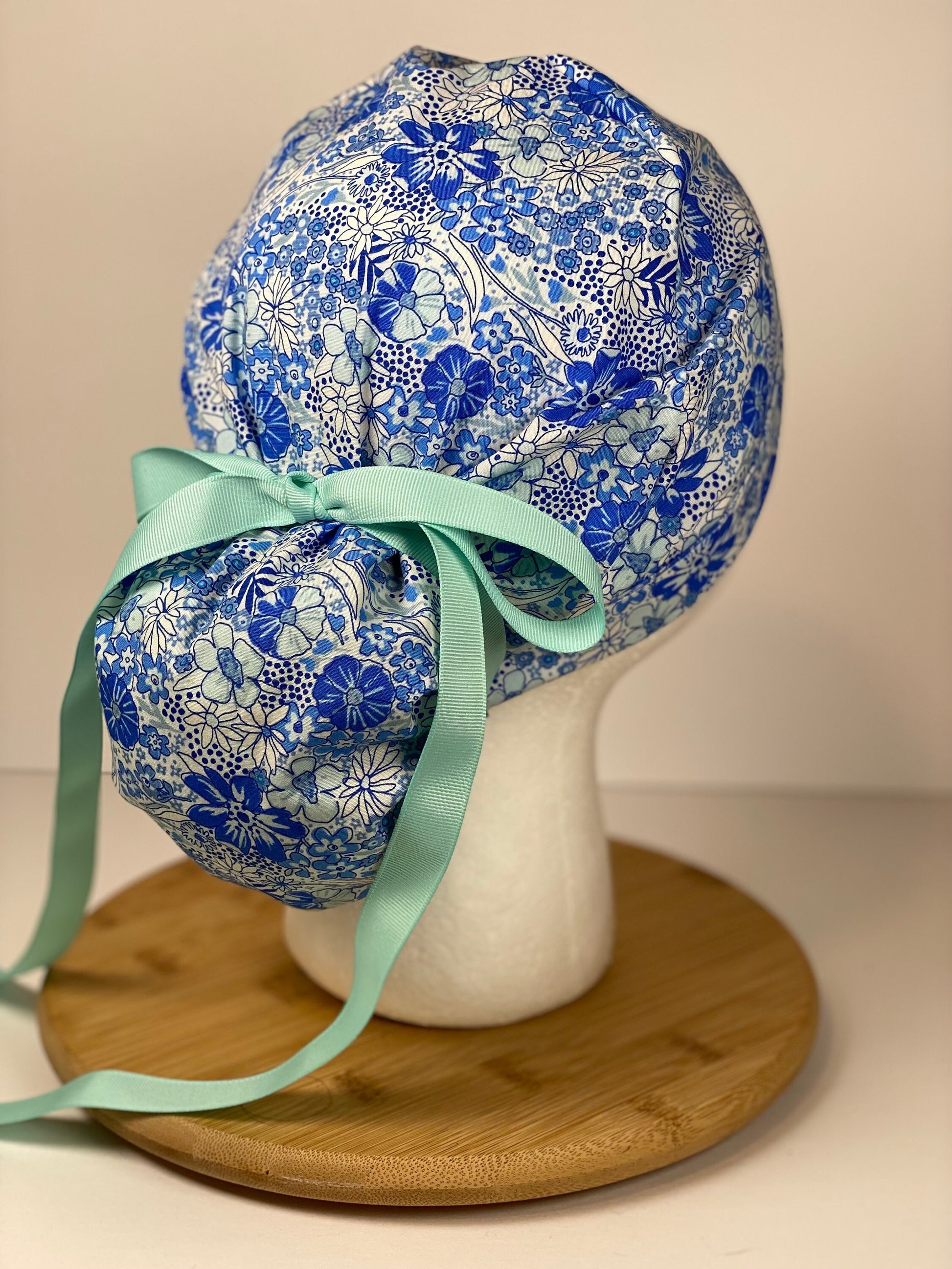 Shades of blue women’s floral scrub cap, blue floral ponytail scrub hat