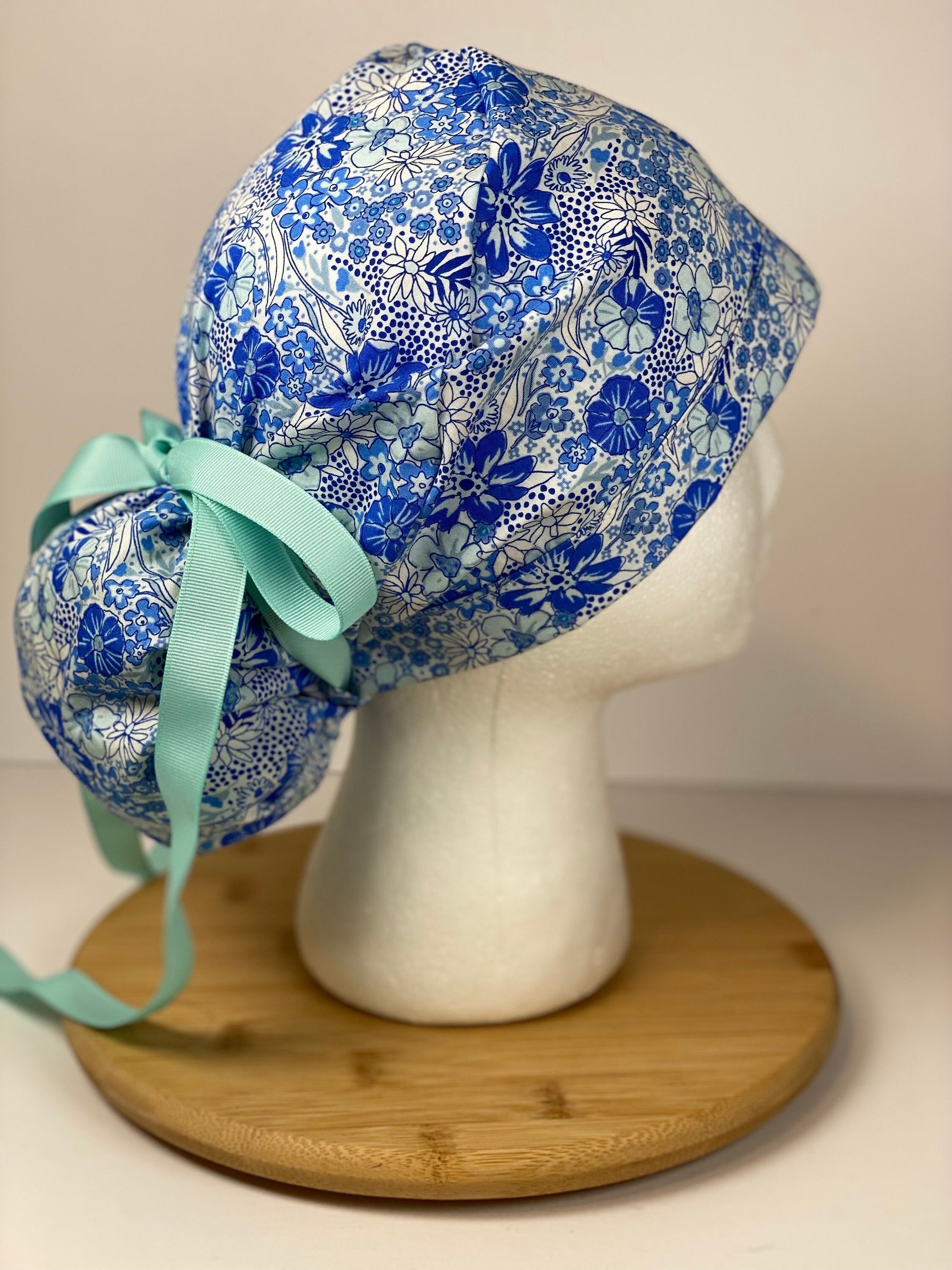 Shades of blue women’s floral scrub cap, blue floral ponytail scrub hat