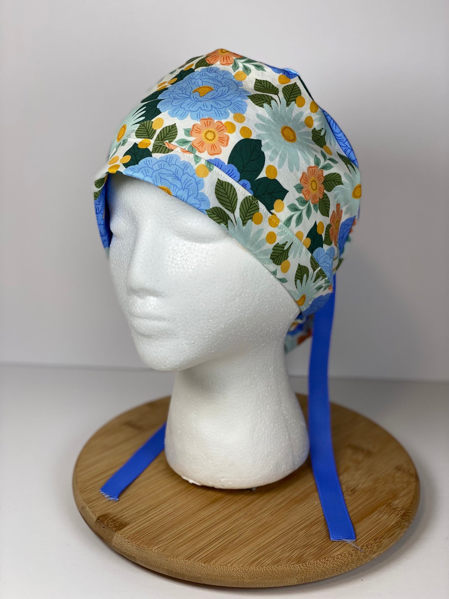 Blue floral women’s scrub cap, blue floral ponytail scrub hat