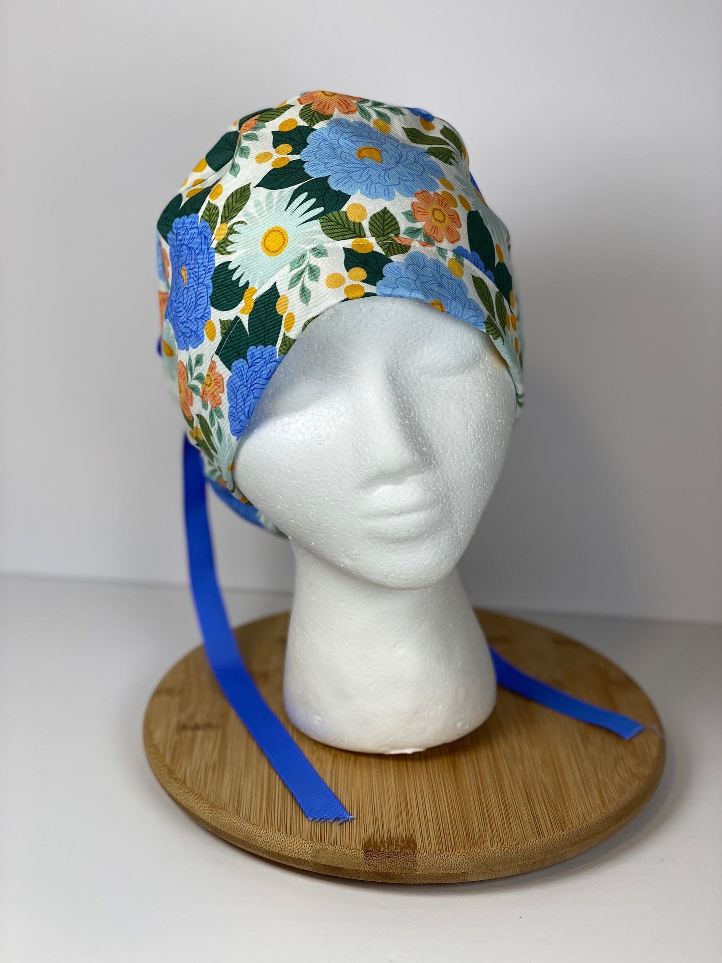 Blue floral women’s scrub cap, blue floral ponytail scrub hat