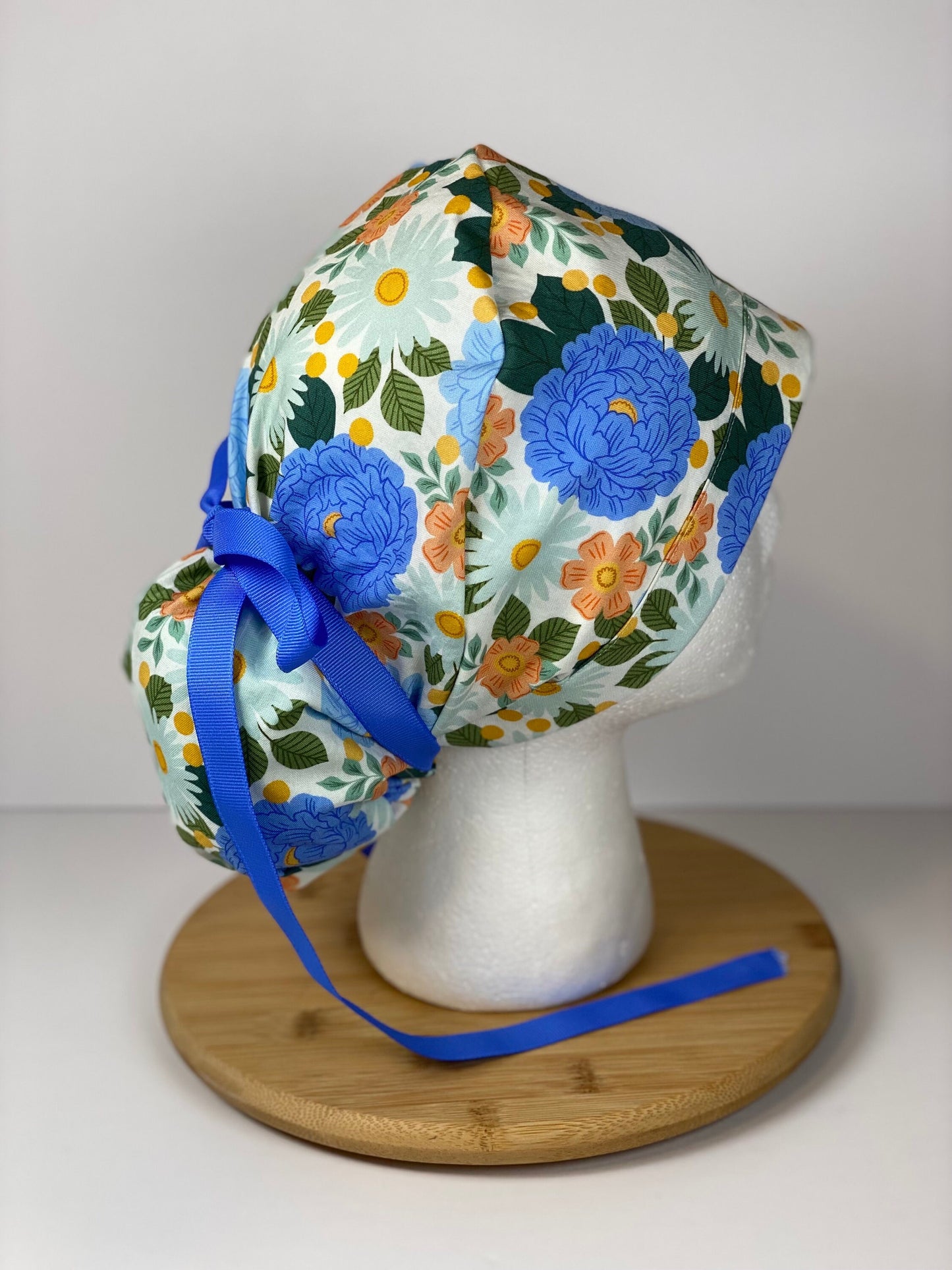 Blue floral women’s scrub cap, blue floral ponytail scrub hat