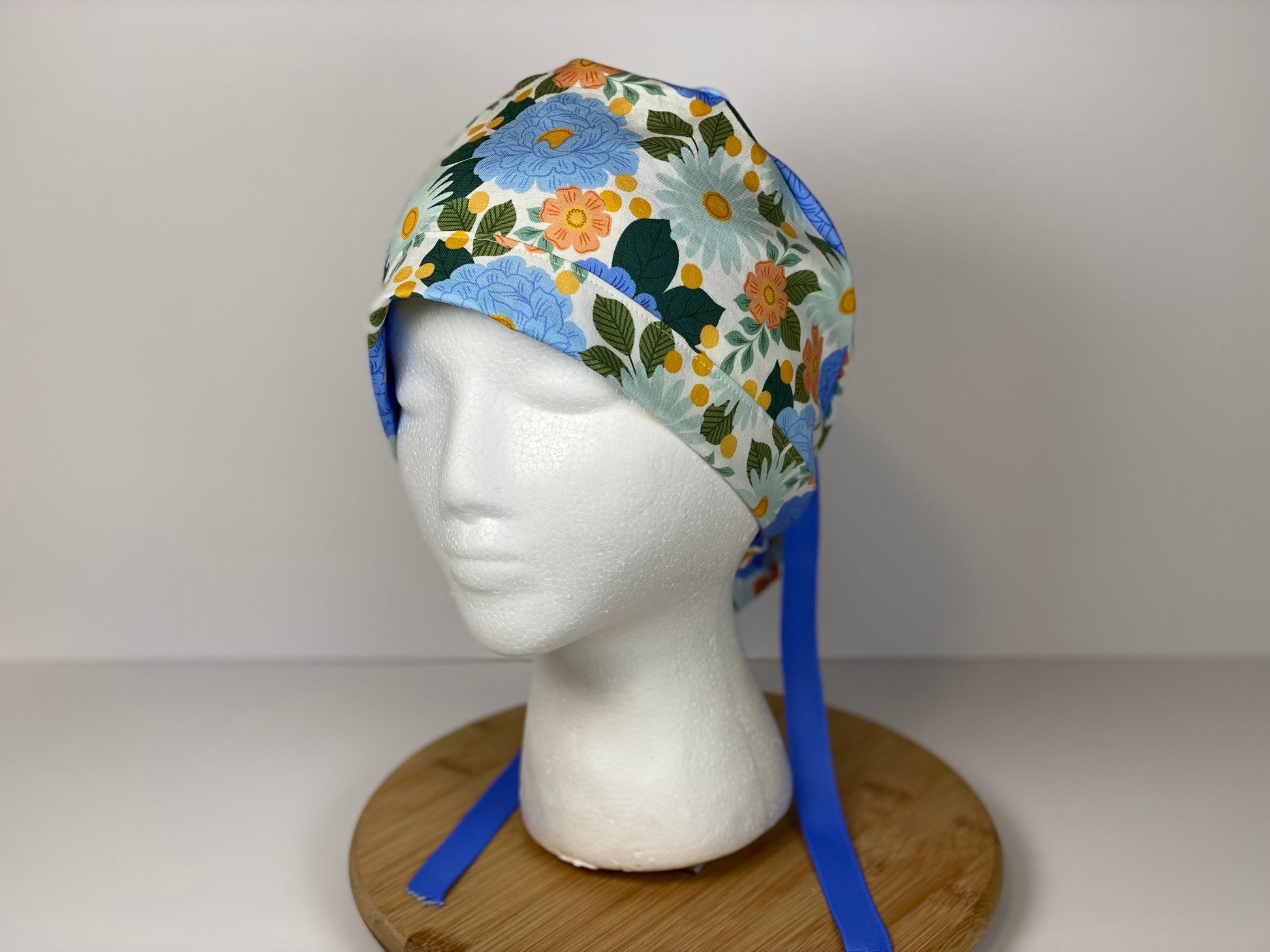 Blue floral women’s scrub cap, blue floral ponytail scrub hat