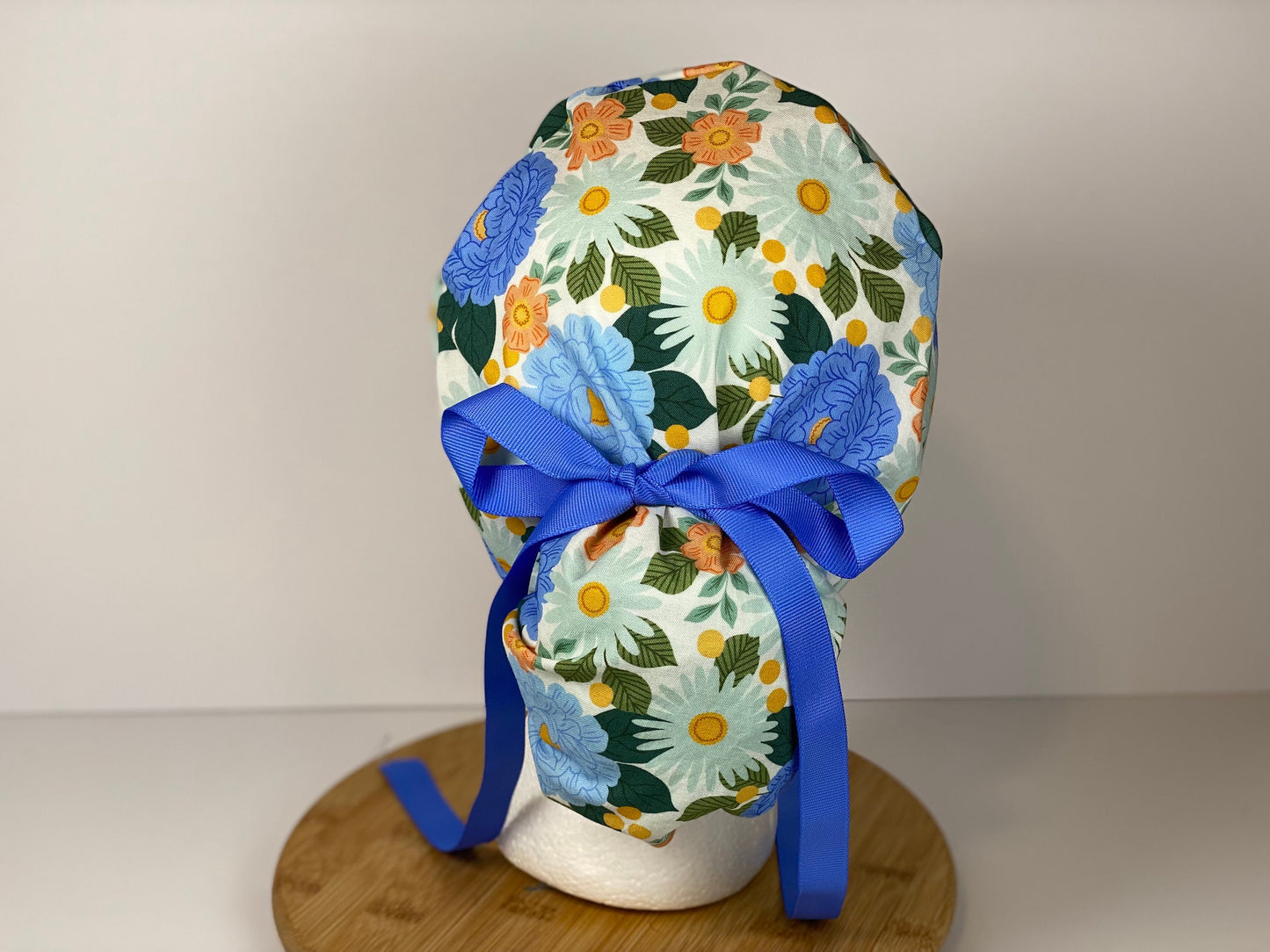 Blue floral women’s scrub cap, blue floral ponytail scrub hat