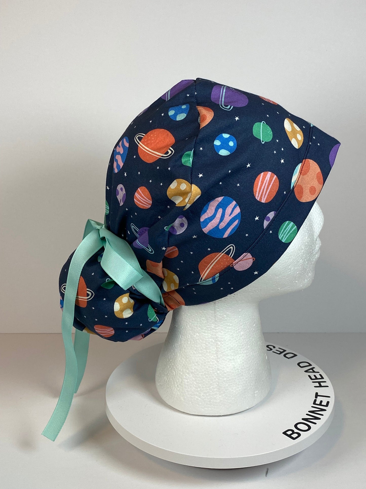 Space print women’s scrub cap, outer space planets ponytail scrub hat