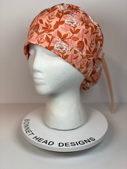 Peach floral ponytail scrub cap, womens peach scrub hat, Bonnet Head Designs