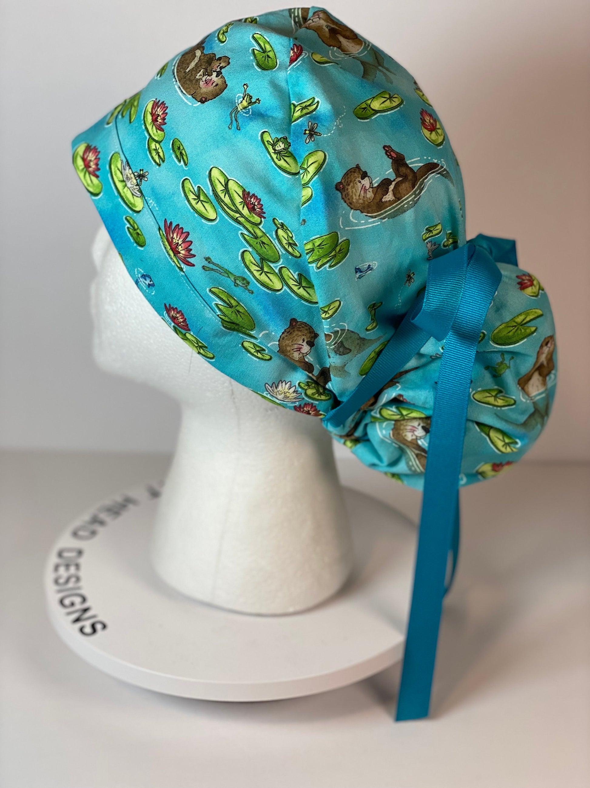 Sea Otter women’s scrub cap, otters scrub hat, otter ponytail scrub hat, Bonnet Head Designs