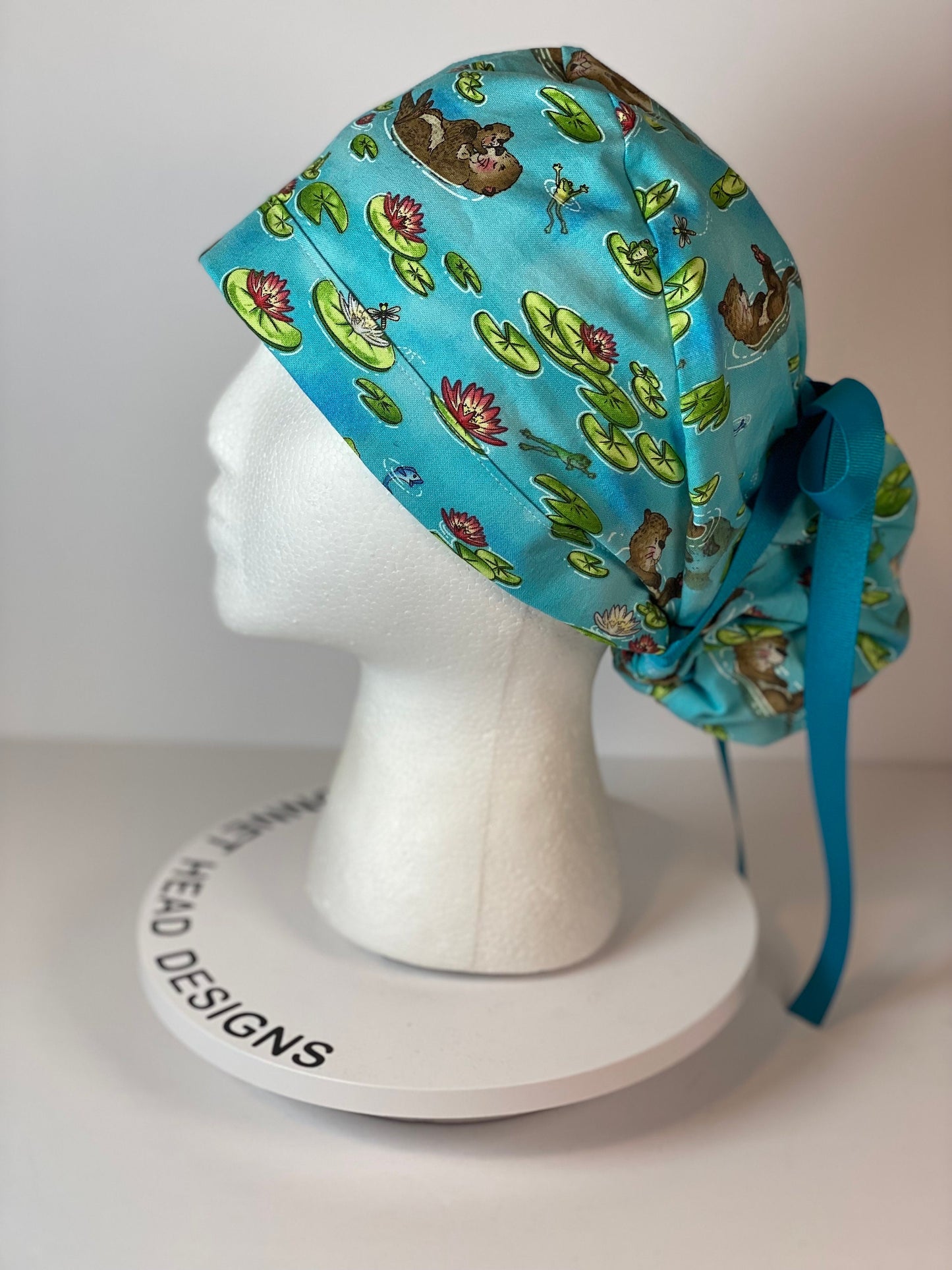 Sea Otter women’s scrub cap, otters scrub hat, otter ponytail scrub hat, Bonnet Head Designs