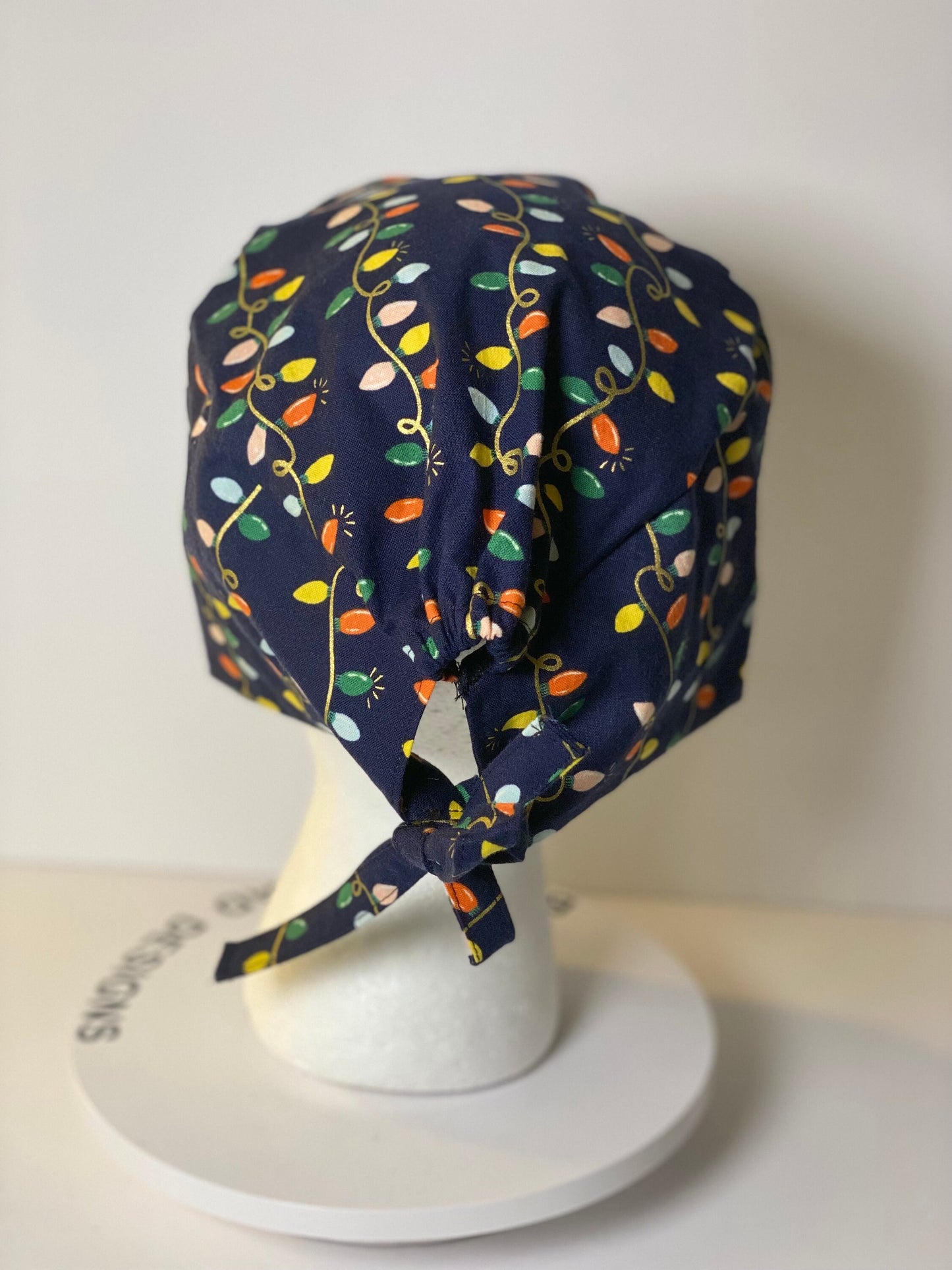 Men’s Navy Christmas lights scrub cap, Rifle Paper Co holiday fabric scrub hat