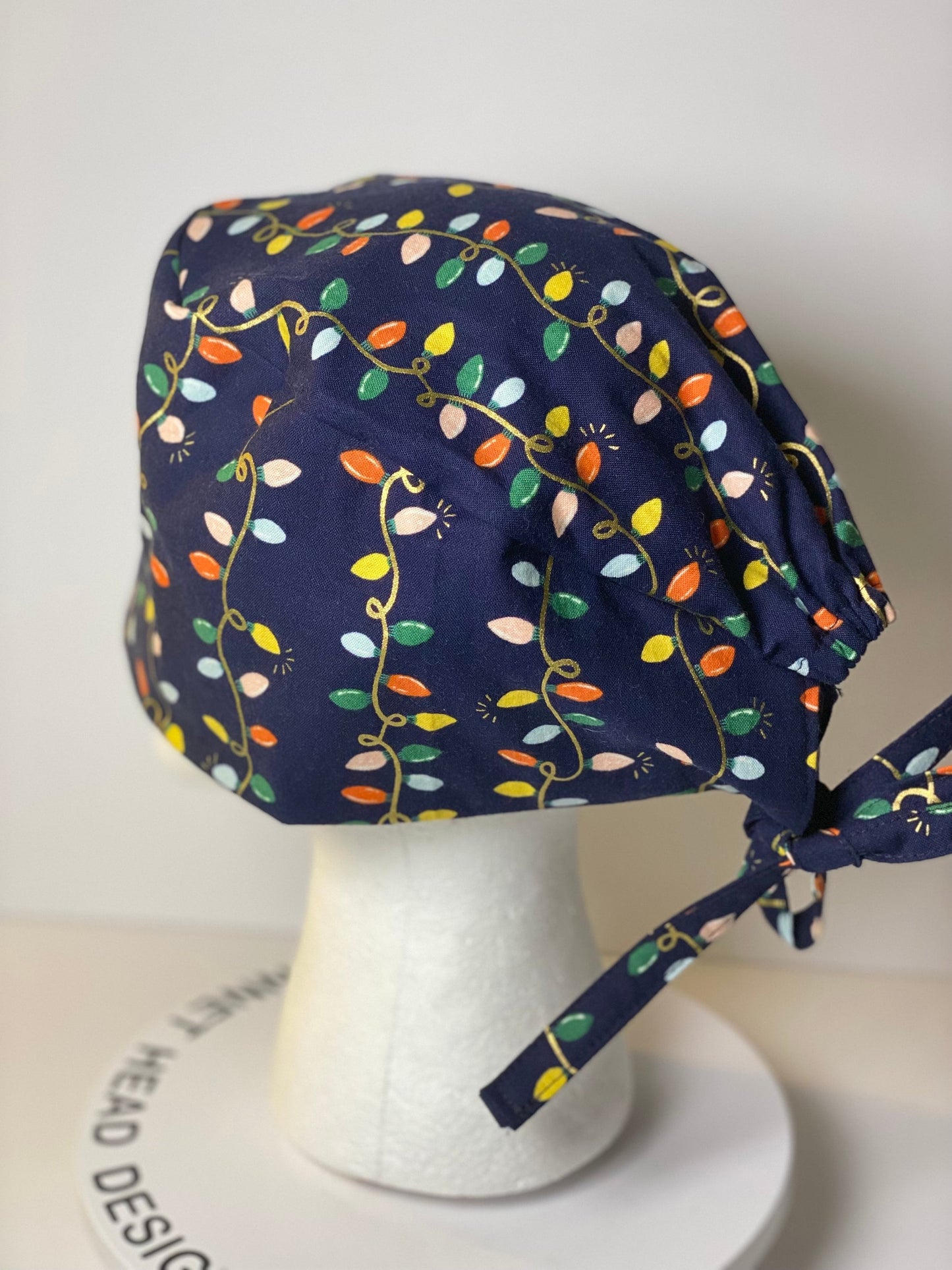 Men’s Navy Christmas lights scrub cap, Rifle Paper Co holiday fabric scrub hat