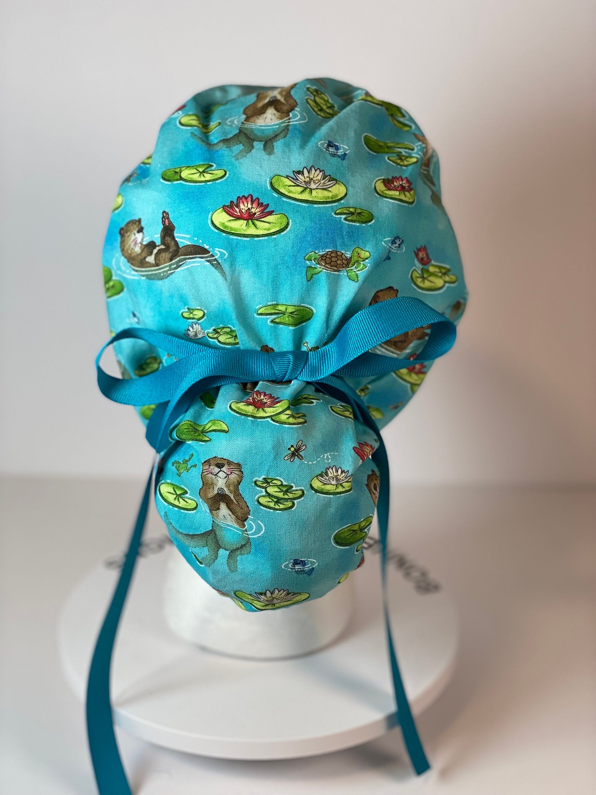 Sea Otter women’s scrub cap, otters scrub hat, otter ponytail scrub hat, Bonnet Head Designs