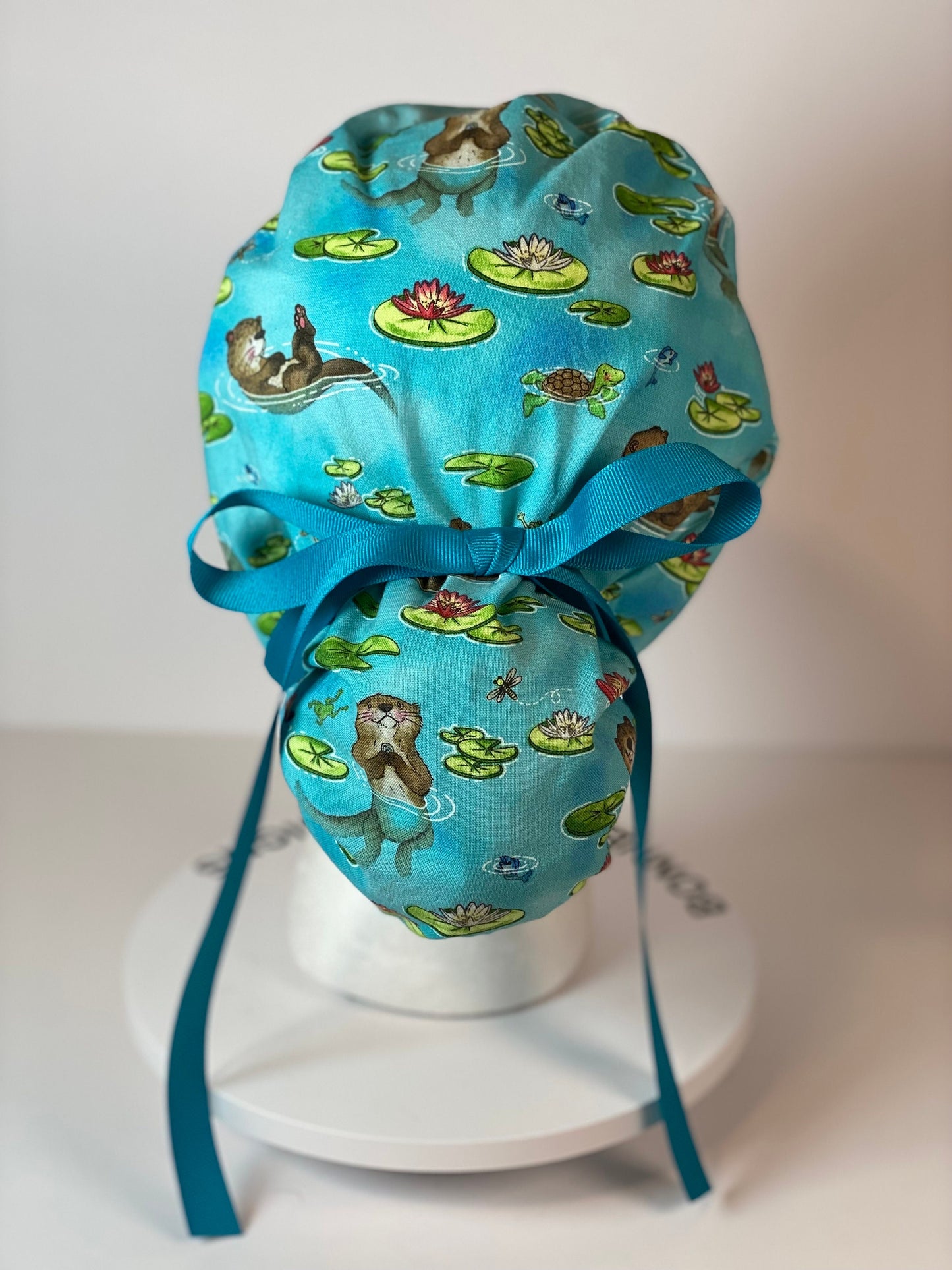 Sea Otter women’s scrub cap, otters scrub hat, otter ponytail scrub hat, Bonnet Head Designs