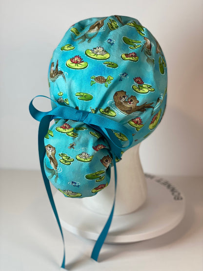 Sea Otter women’s scrub cap, otters scrub hat, otter ponytail scrub hat, Bonnet Head Designs