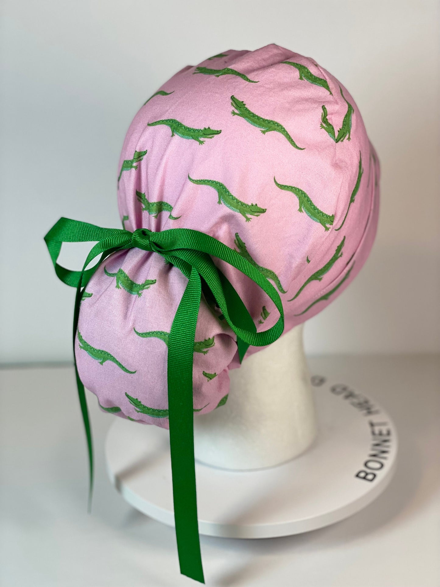 Pink and green alligators women's ponytail scrub cap, Bonnet Head Designs