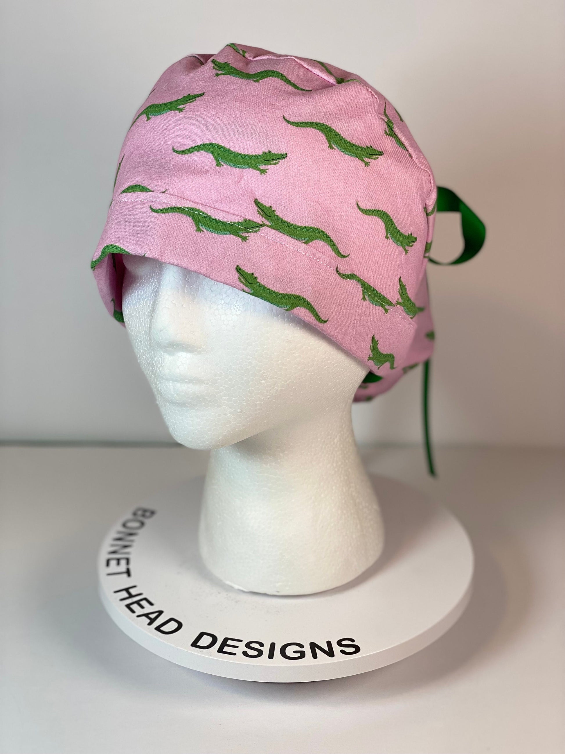 Pink and green alligators women's ponytail scrub cap, Bonnet Head Designs