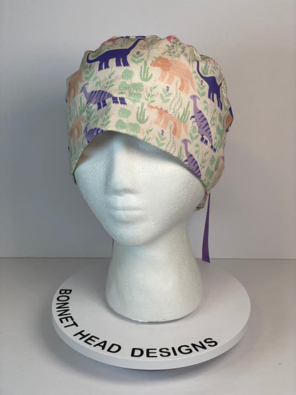 Pink and purple Dinosaur print scrub cap, ponytail scrub hat girly dinosaurs, Bonnet Head Designs