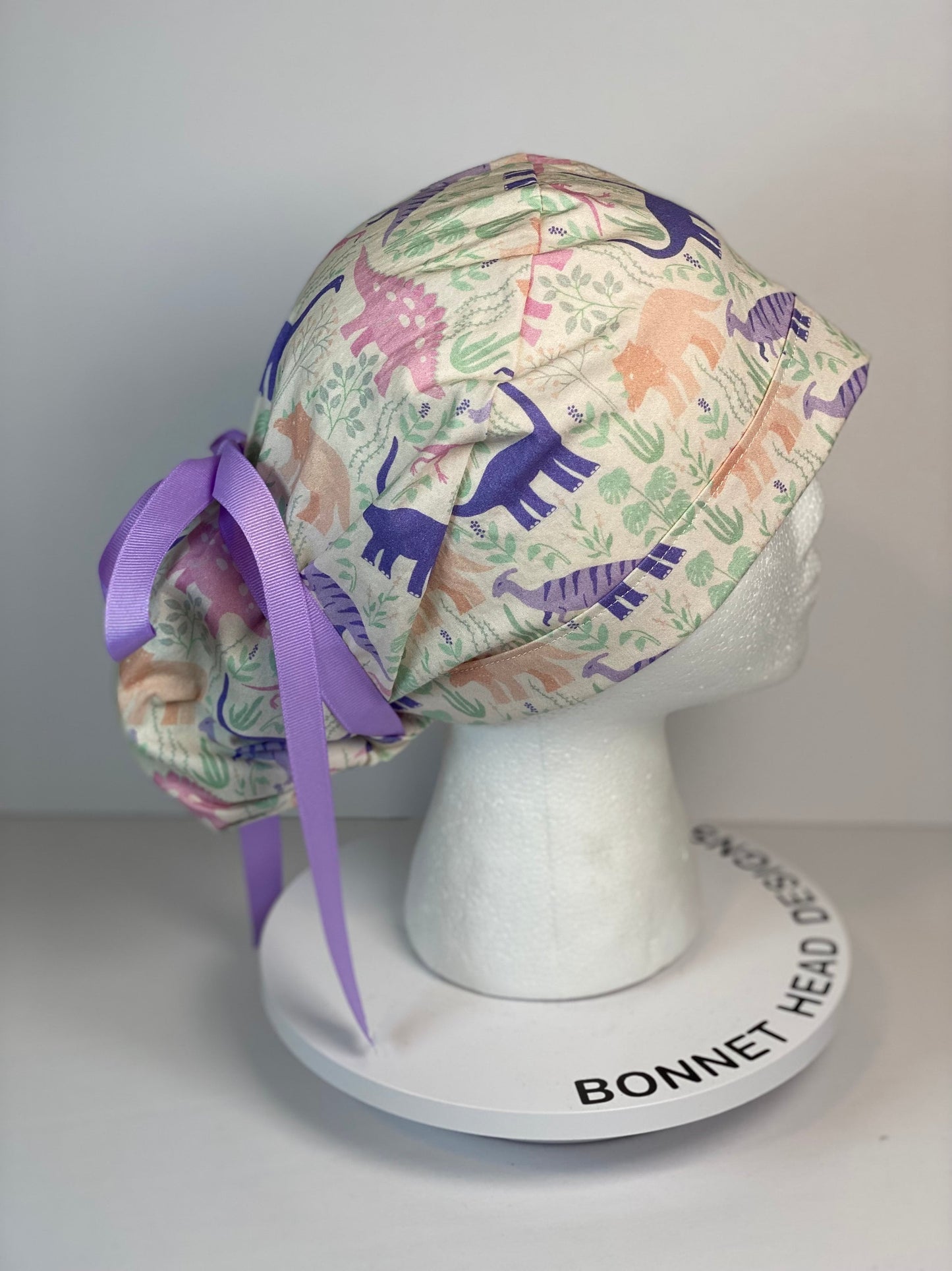 Pink and purple Dinosaur print scrub cap, ponytail scrub hat girly dinosaurs, Bonnet Head Designs