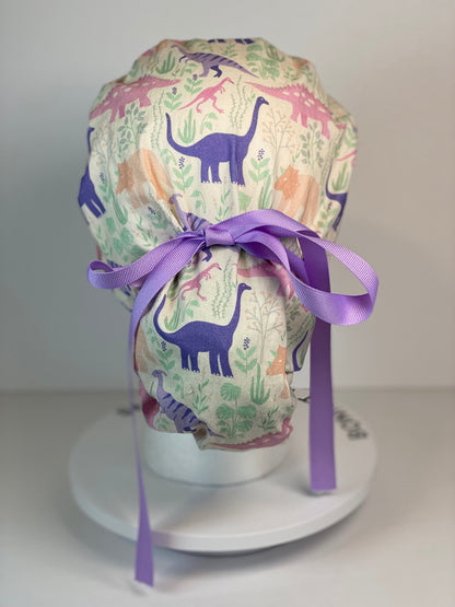 Pink and purple Dinosaur print scrub cap, ponytail scrub hat girly dinosaurs, Bonnet Head Designs