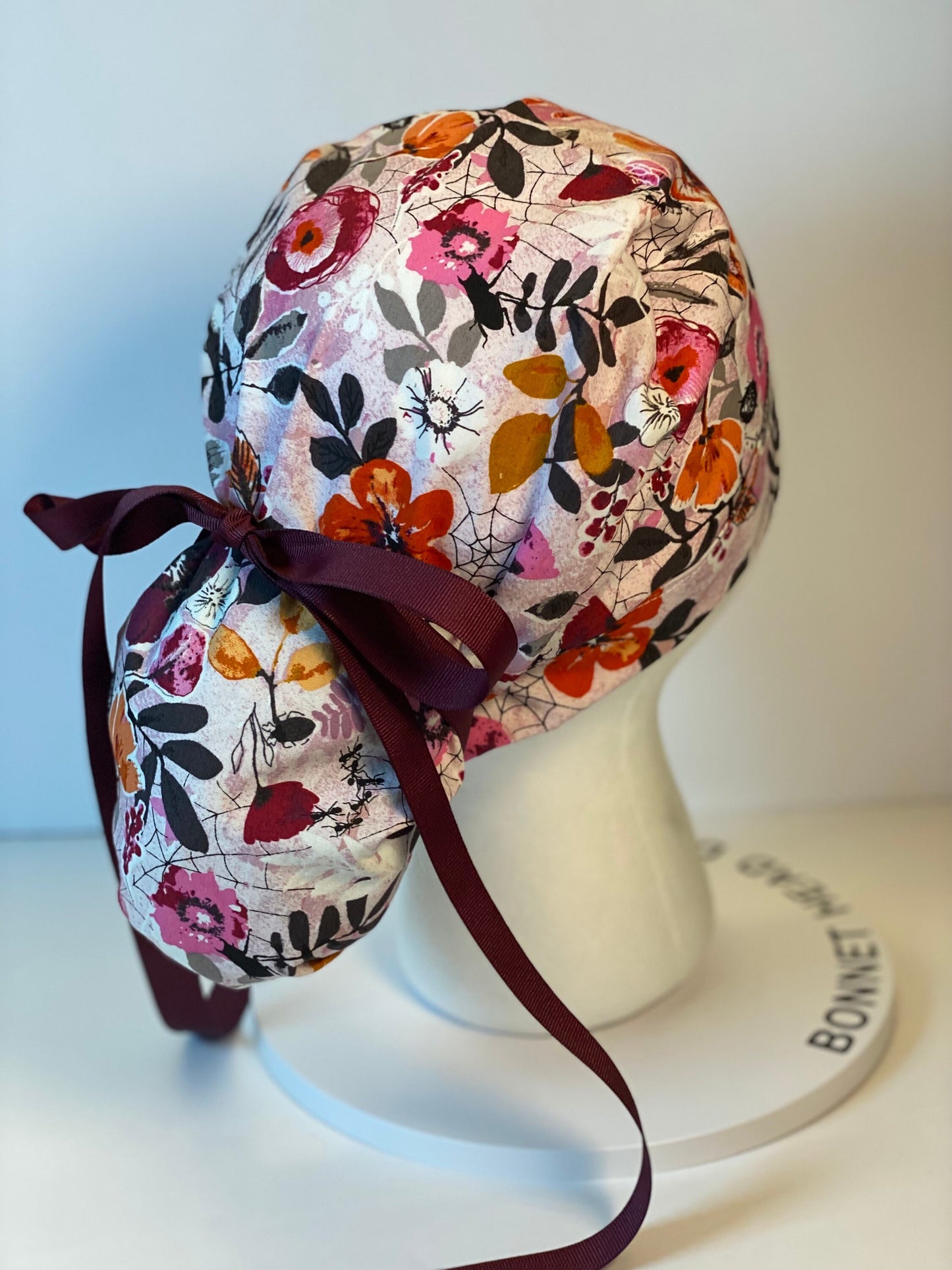 Eerie Halloween pink floral ponytail scrub hat, women’s Halloween floral scrub cap