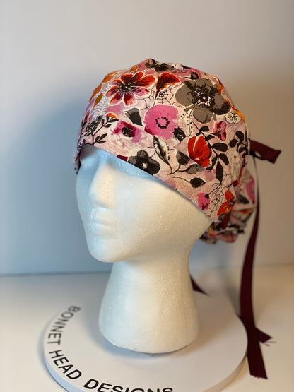 Eerie Halloween pink floral ponytail scrub hat, women’s Halloween floral scrub cap