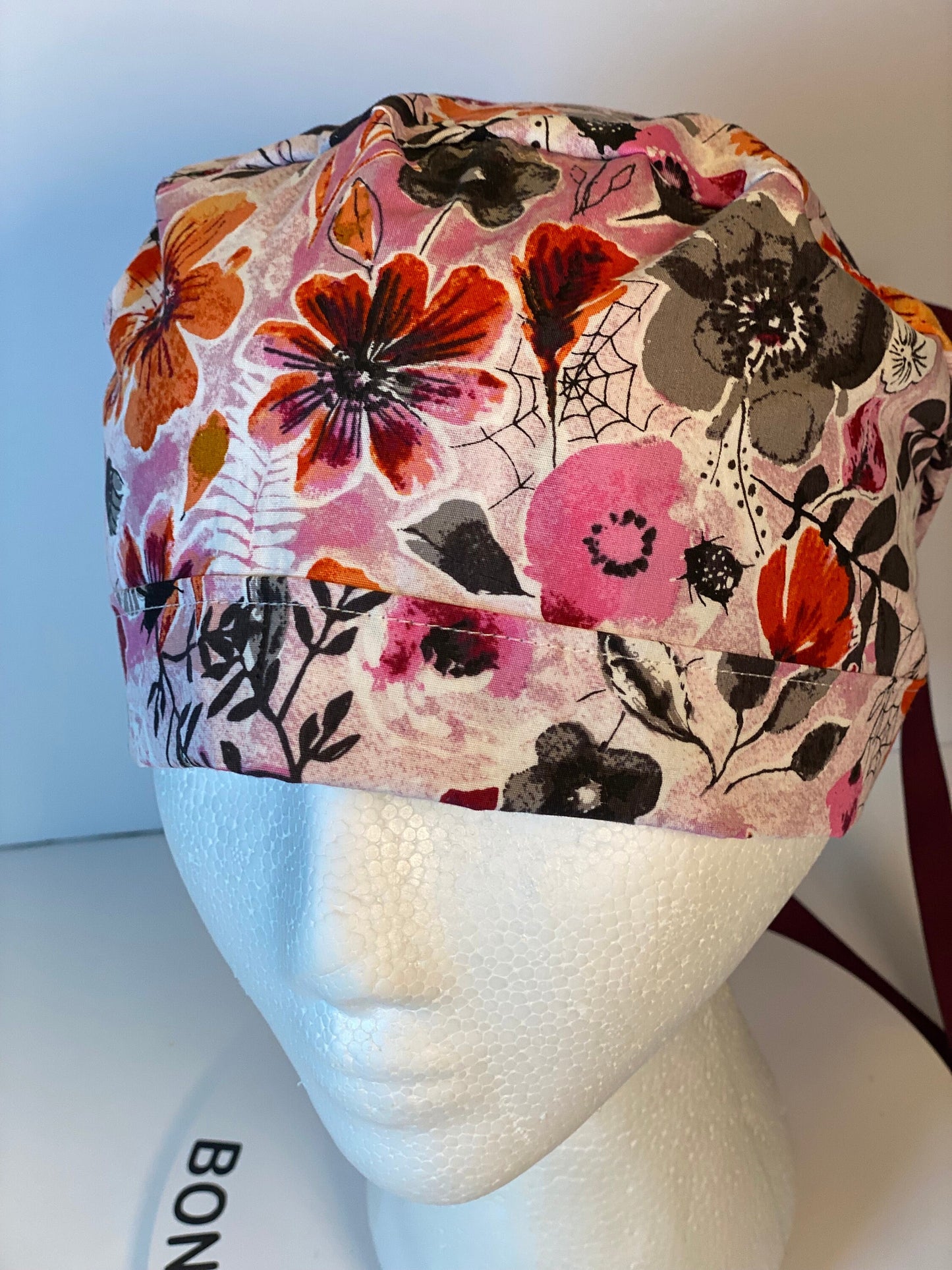 Eerie Halloween pink floral ponytail scrub hat, women’s Halloween floral scrub cap