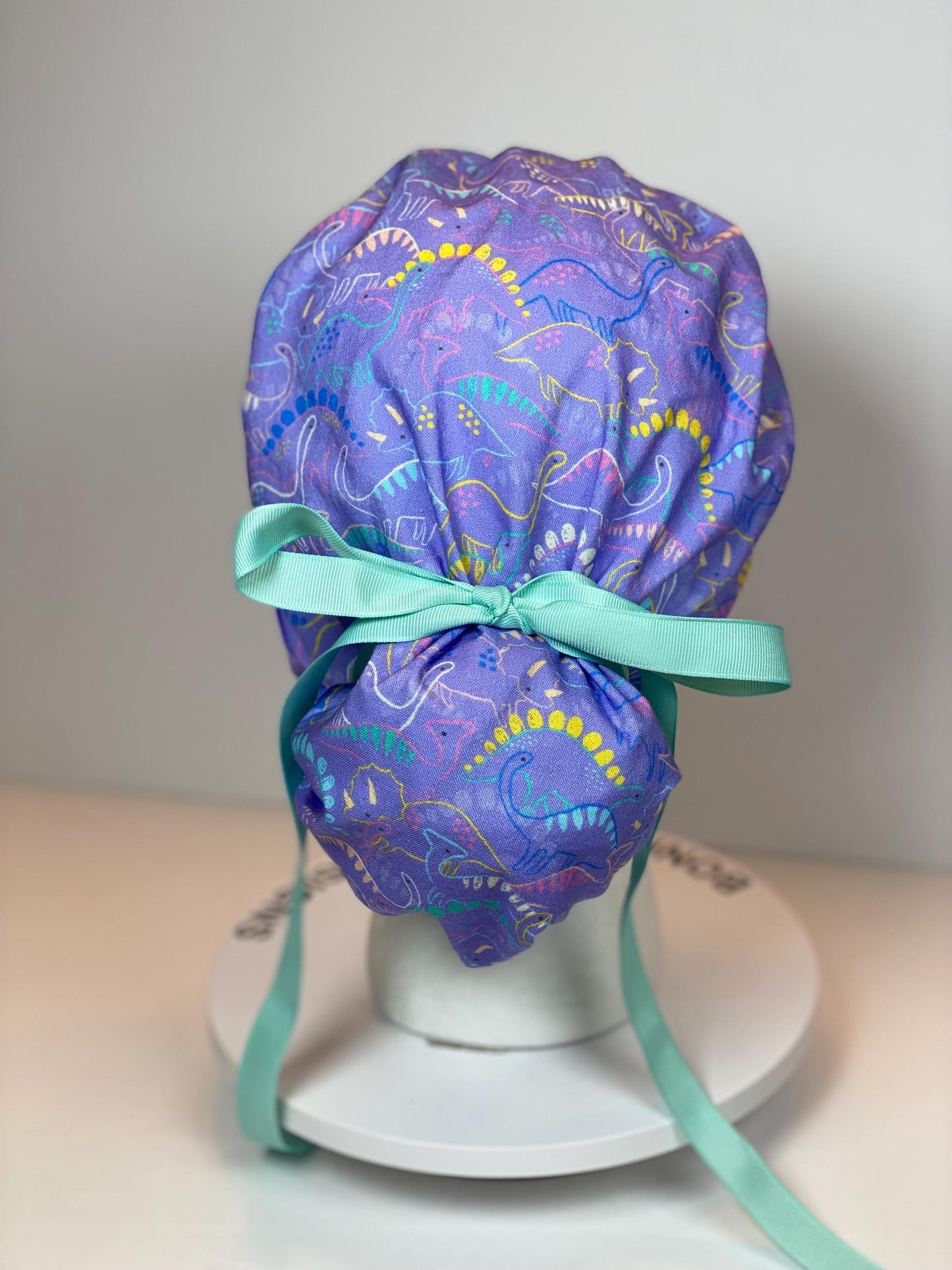 Purple Dinosaur print scrub cap, ponytail scrub hat girly dinosaurs, Bonnet Head Designs