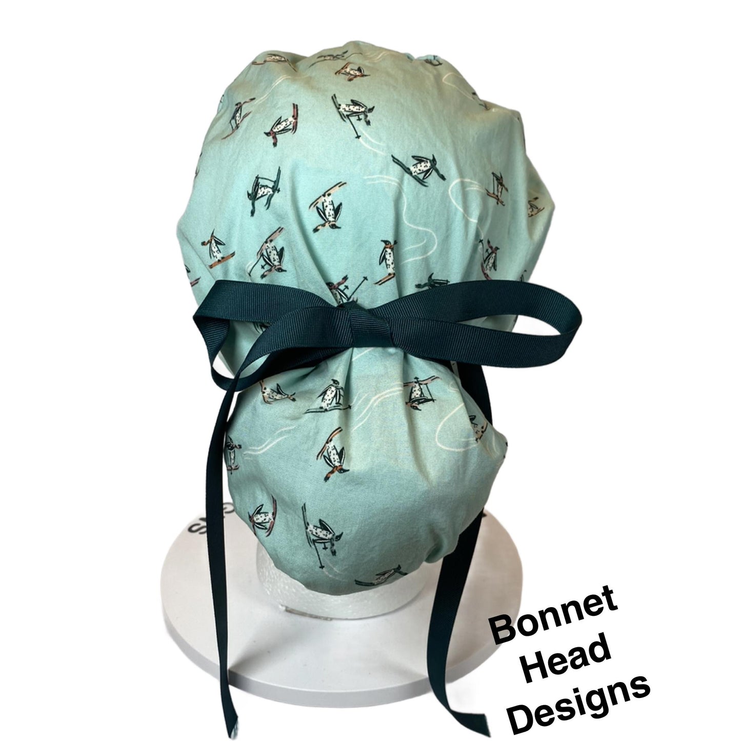 Skiing Penguins winter ponytail style scrub cap, winter penguins scrub hat, Bonnet Head Designs