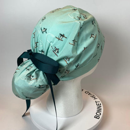 Skiing Penguins winter ponytail style scrub cap, winter penguins scrub hat, Bonnet Head Designs