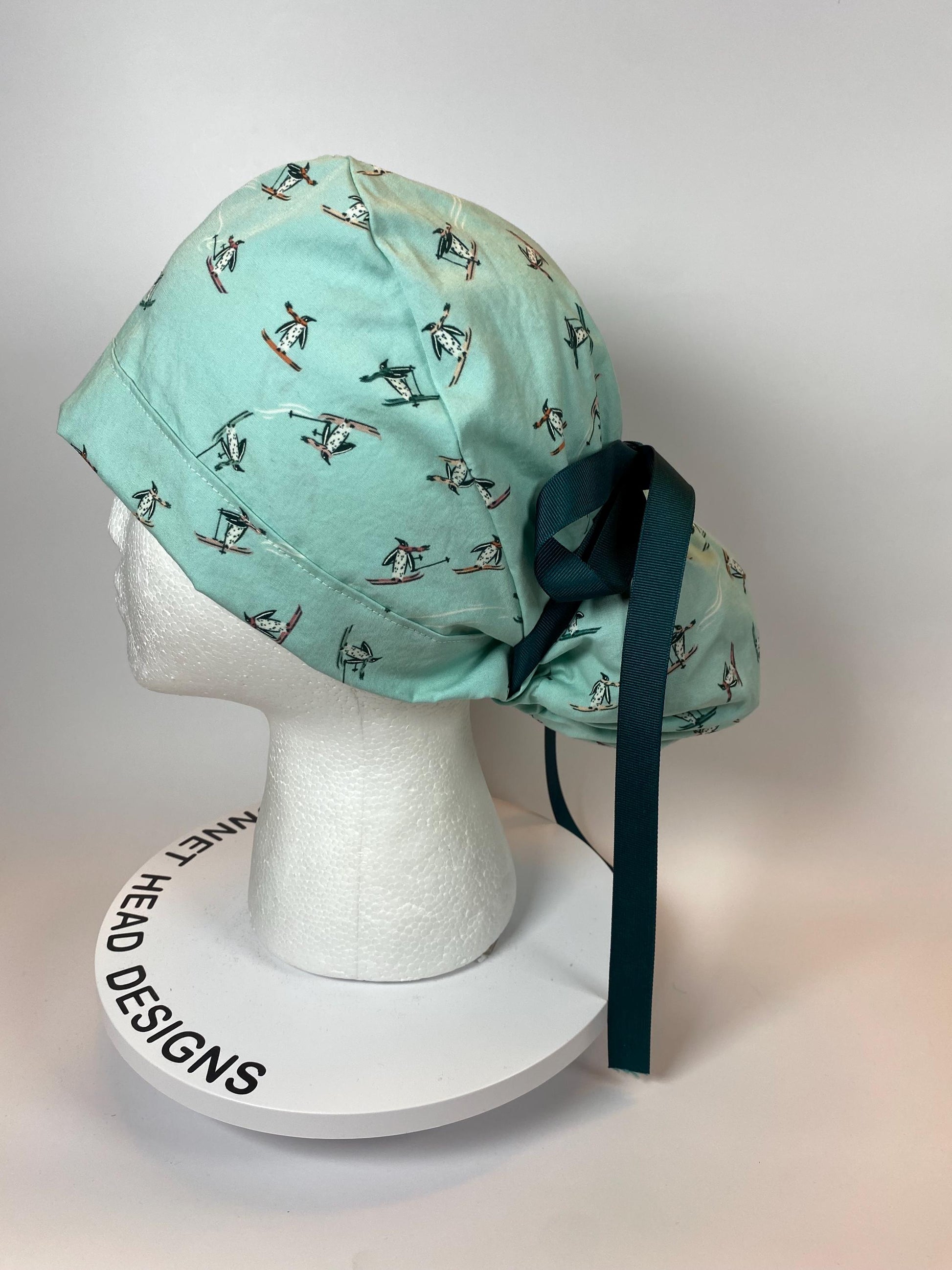 Skiing Penguins winter ponytail style scrub cap, winter penguins scrub hat, Bonnet Head Designs