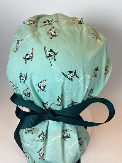 Skiing Penguins winter ponytail style scrub cap, winter penguins scrub hat, Bonnet Head Designs