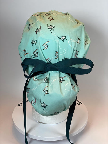 Skiing Penguins winter ponytail style scrub cap, winter penguins scrub hat, Bonnet Head Designs