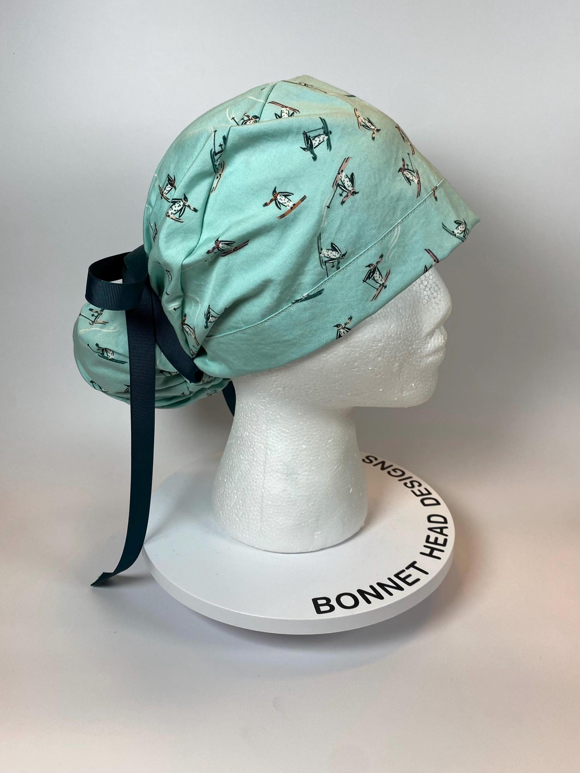 Skiing Penguins winter ponytail style scrub cap, winter penguins scrub hat, Bonnet Head Designs