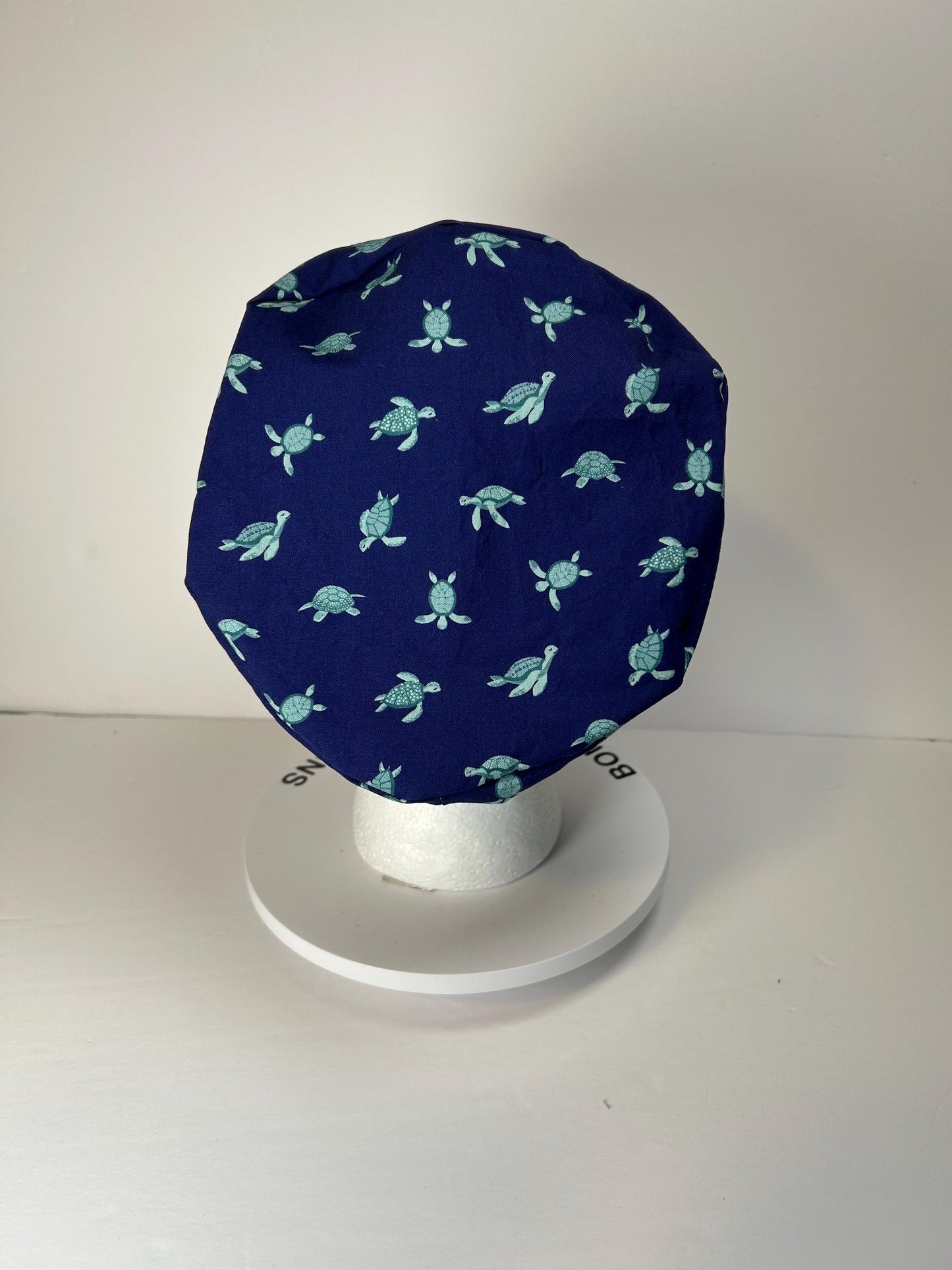 Navy Sea turtle euro style scrub cap, women’s turtle print scrub cap with toggle, Bonnet Head Designs