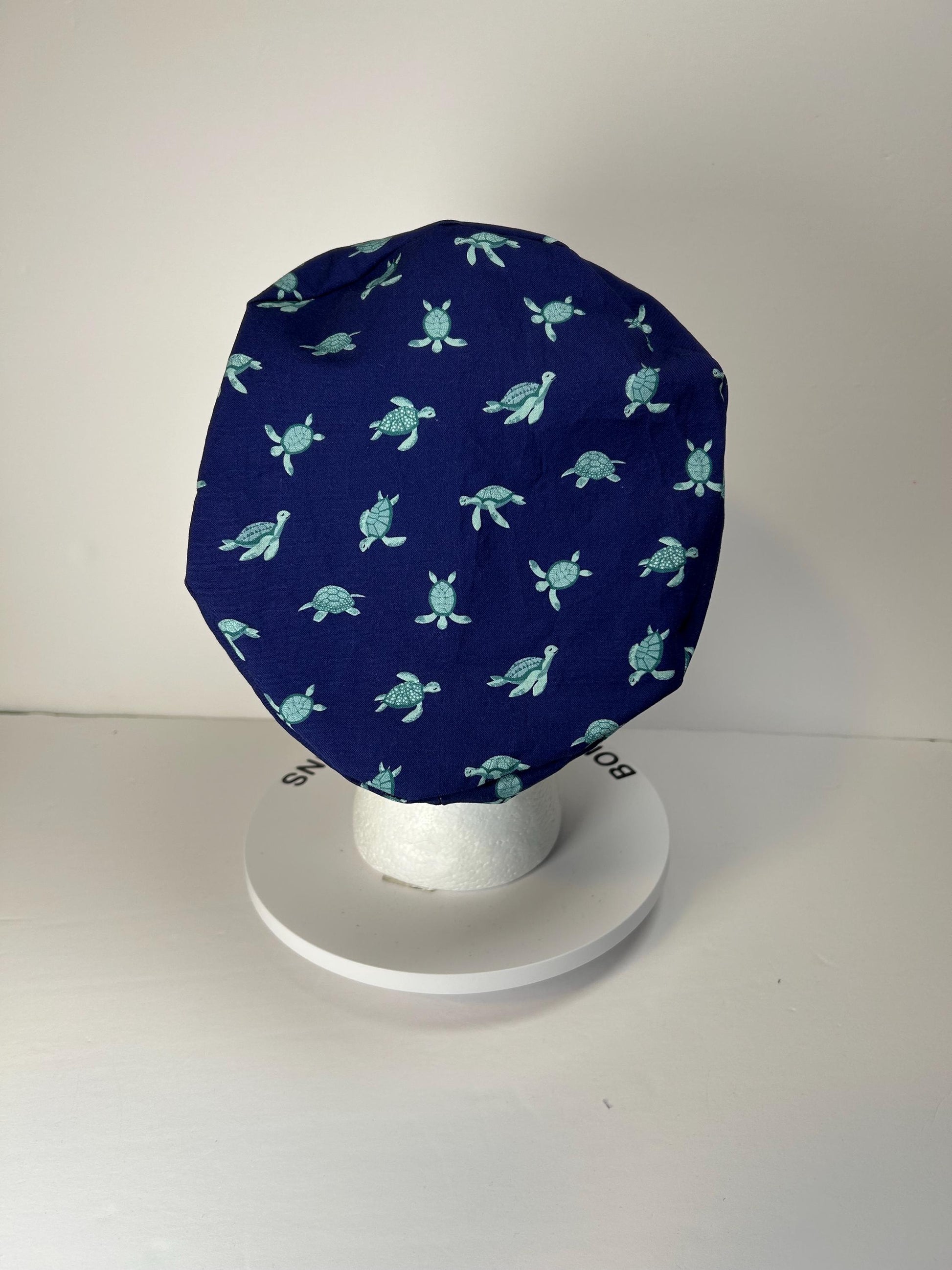 Navy Sea turtle euro style scrub cap, women’s turtle print scrub cap with toggle, Bonnet Head Designs
