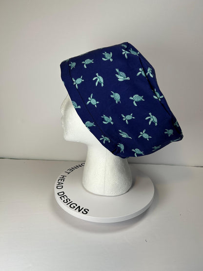 Navy Sea turtle euro style scrub cap, women’s turtle print scrub cap with toggle, Bonnet Head Designs